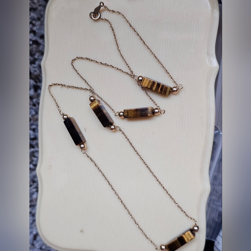 14k tigers eye station necklace. Stamped 14k on the tag and clasp. 14k also for